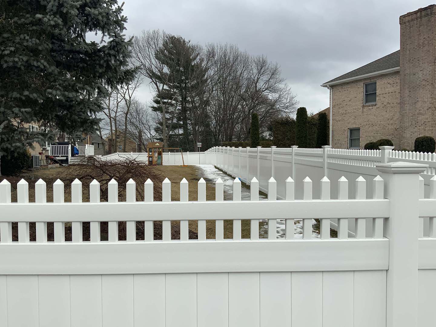 Vinyl fence project completed by New England Automatic Gate in the Merrimack Valley, Massachusetts