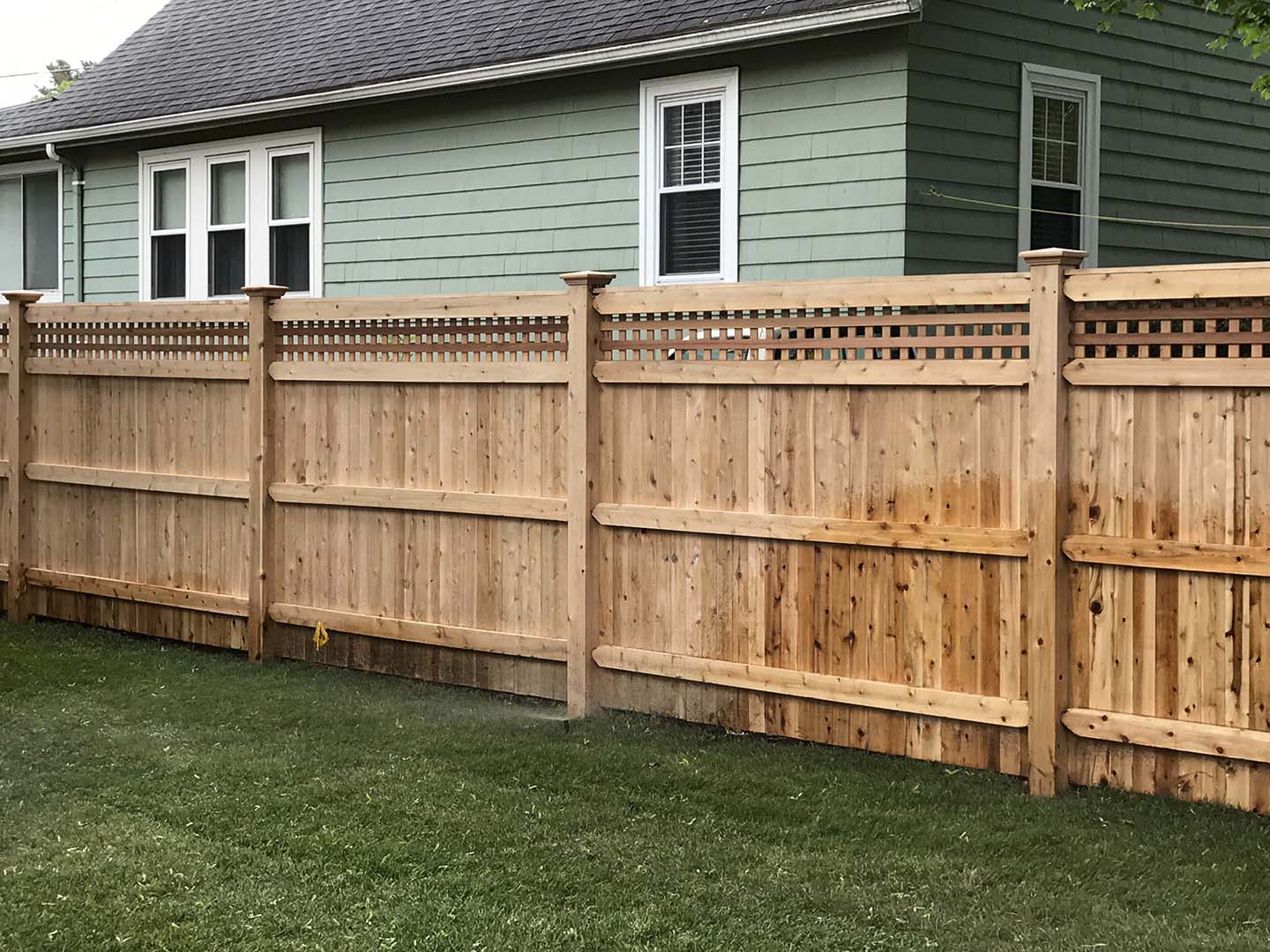 Wood fence project completed by New England Automatic Gate in the Merrimack Valley, Massachusetts