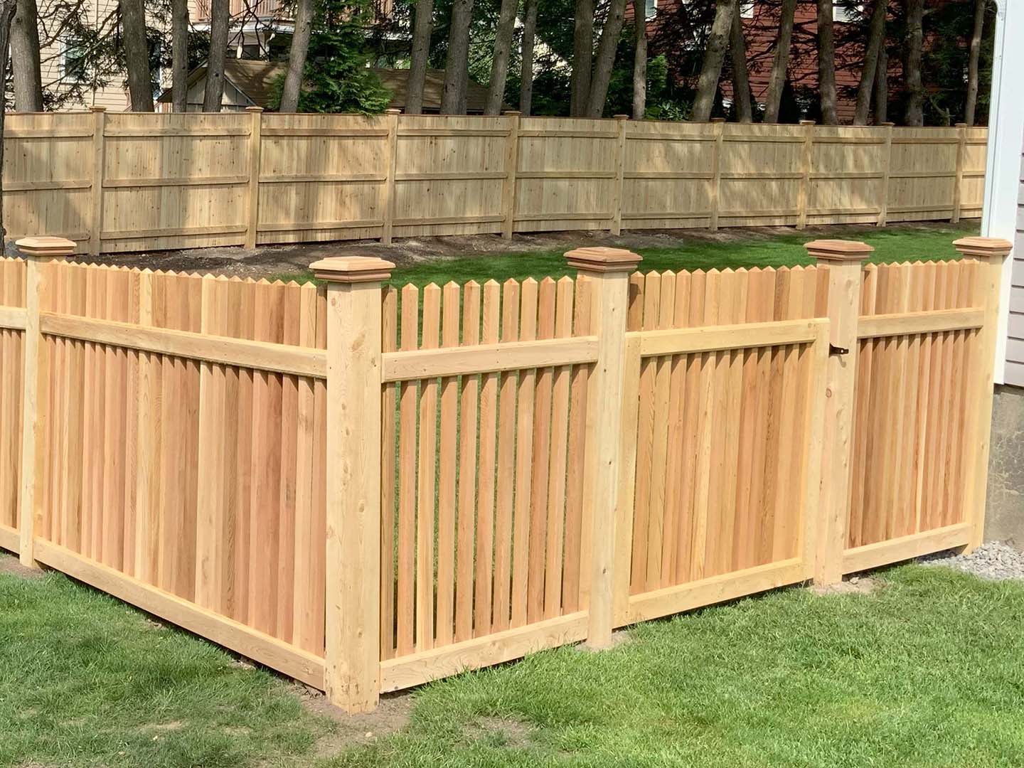 Wood fence project completed by New England Automatic Gate in the Merrimack Valley, Massachusetts