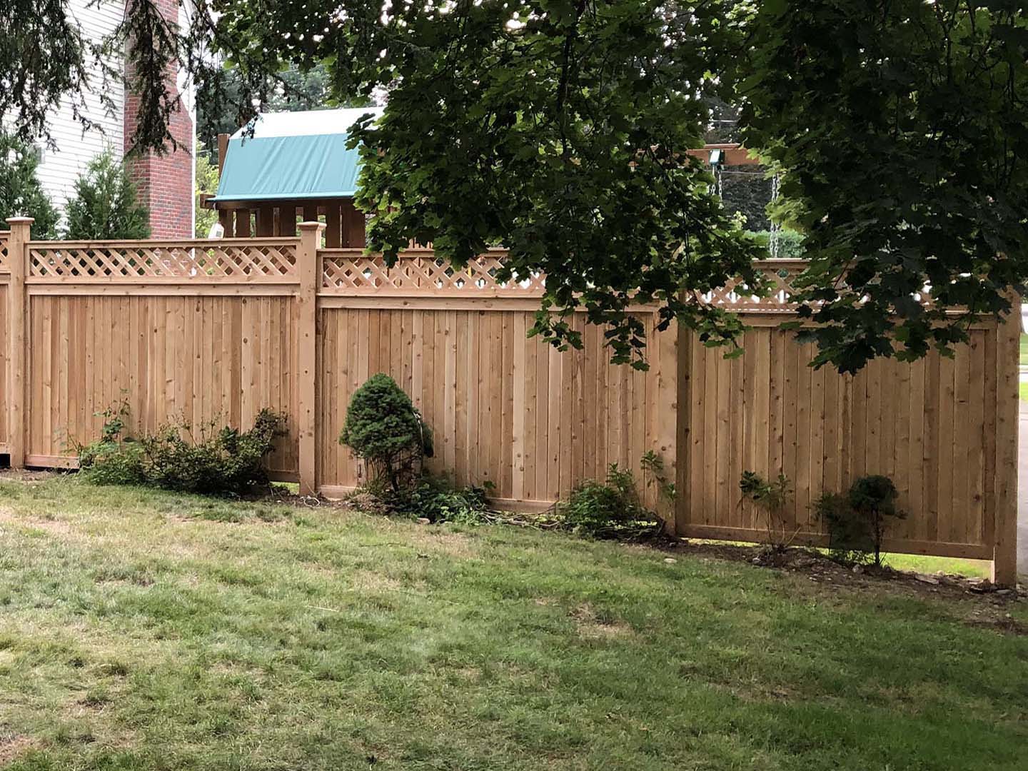 Wood fence project completed by New England Automatic Gate in the Merrimack Valley, Massachusetts