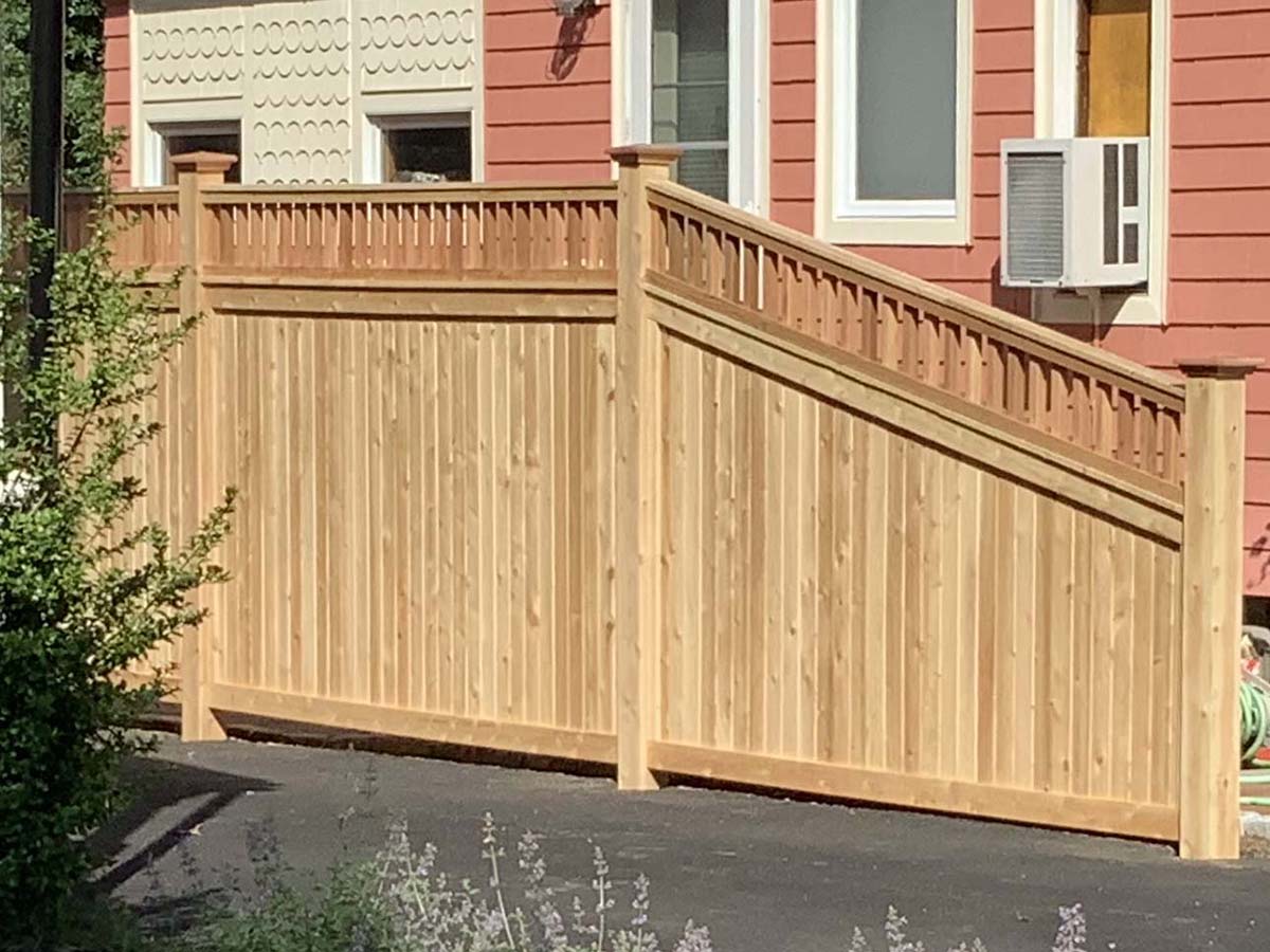 Wood fence project completed by New England Automatic Gate in the Merrimack Valley, Massachusetts