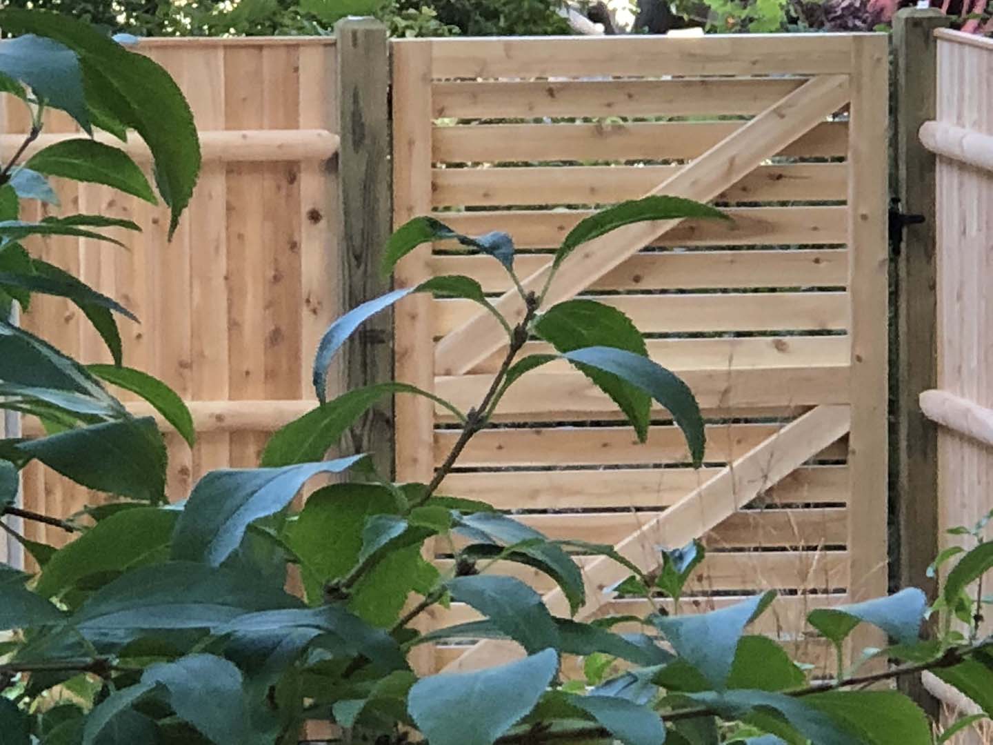 Wood fence project completed by New England Automatic Gate in the Merrimack Valley, Massachusetts
