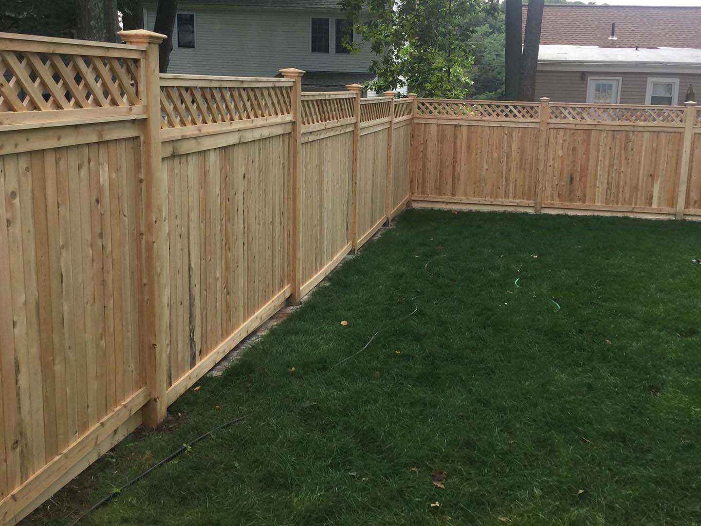 Wood fence project completed by New England Automatic Gate in the Merrimack Valley, Massachusetts