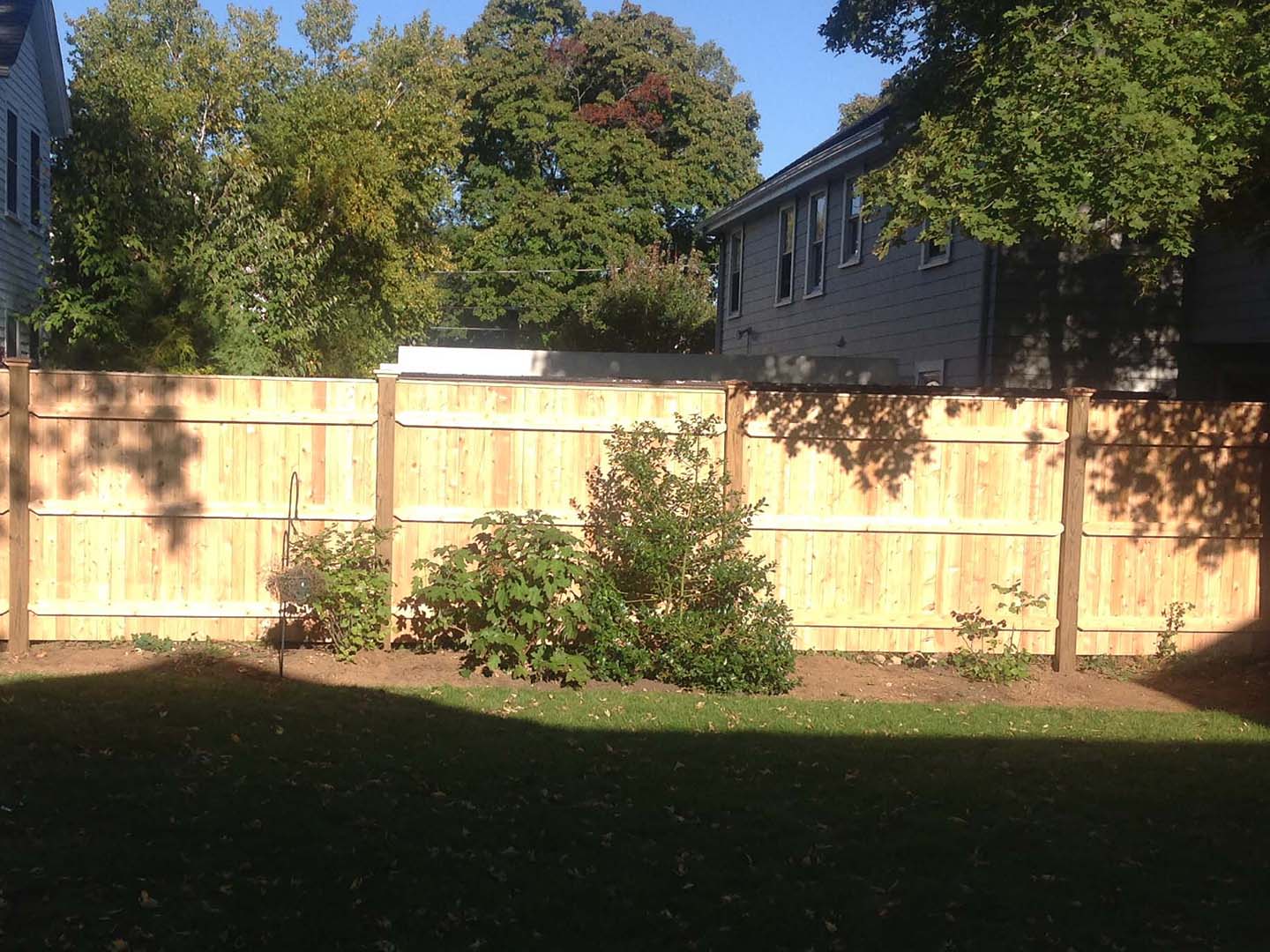 Wood fence project completed by New England Automatic Gate in the Merrimack Valley, Massachusetts